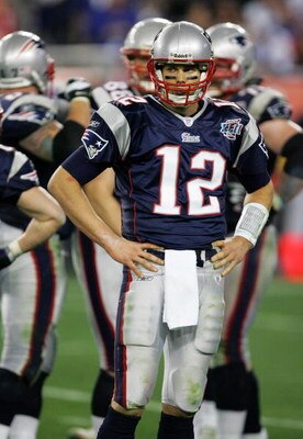 GLENDALE, AZ - FEBRUARY 03:  Tom Brady #12 of the New England Patriots waits for a play in the fourth quarter of Super Bowl XLII against the New York Giants on February 3, 2008 at the University of Phoenix Stadium in Glendale, Arizona.  (Photo by Streeter