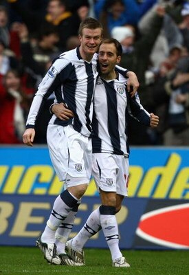 WEST BROMWICH, UNITED KINGDOM - JANUARY 17:  Chris Brunt (L) celebrates with teammate Borja Valero (R) of West Bromwich Albion after Brunt scored his team's first goal during the Barclays Premier League match between West Bromwich Albion and Middlesbrough
