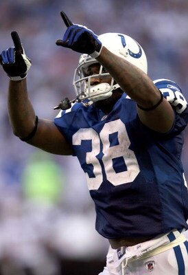 INDIANAPOLIS - OCTOBER 12:  Dominic Rhodes #38 of the Indianapolis Colts celebrates after running for a touchdown during the NFL game against the Baltimore Ravens at Lucas Oil Stadium on October 12, 2008 in Indianapolis, Indiana.  (Photo by Andy Lyons/Get