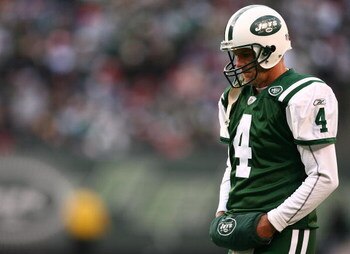 EAST RUTHERFORD, NJ - DECEMBER 14:  Brett Favre #4 of The New York Jets walks on the field against The Buffalo Bills during their game on December 14, 2008 at Giants Stadium in East Rutherford, New Jersey.  (Photo by Al Bello/Getty Images)