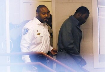 Sussex, VA - NOVEMBER 25:  Suspended Atlanta Falcons quarterback Michael Vick (R) leaves Surry County Circuit Court after entering a guilty plea on two felony counts connected to dog fighting on November 25, 2008 in Sussex, Virginia. Under a plea agreemen