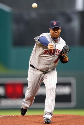 KANSAS CITY, MO - MAY 28:  Livan Hernandez #61 of the Minnesota Twins delivers a pitch against the Kansas City Royals on May 28, 2008 at Kauffman Stadium in Kansas City, Missouri. (Photo by G. Newman Lowrance/Getty Images)