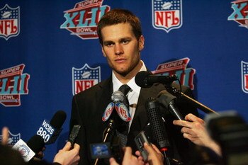 GLENDALE, AZ - FEBRUARY 03:  Tom Brady #12 of the New England Patriots answers questions after losing to the New York Giants 17-14 in Super Bowl XLII on February 3, 2008 at the University of Phoenix Stadium in Glendale, Arizona.  (Photo by Streeter Lecka/