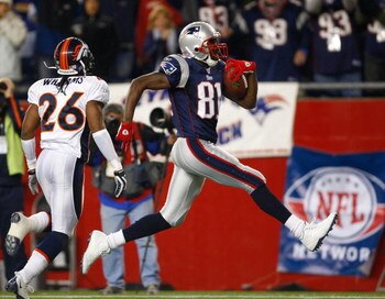 FOXBORO, MA - OCTOBER 20: Jack Williams #26 of the Denver Broncos cannot stop a touchdown by Randy Moss #81 of the New England Patriots at Gillette Stadium on October 20, 2008 in Foxboro, Massachusetts. The Patriots won 41-7. (Photo by Jim Rogash/Getty Im