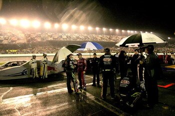 DAYTONA BEACH, FL - FEBRUARY 15:  Drivers and crew members wait out a rain delayduring the NASCAR Sprint Cup Series Daytona 500 at Daytona International Speedway on February 15, 2009 in Daytona Beach, Florida. The race was called at 162 lap due to weather