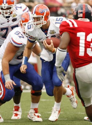 OXFORD, MS - SEPTEMBER 22: Tim Tebow #15 of the Florida Gators runs against the Mississippi Rebels on September 22, 2007 at Vaught-Hemingway Stadium/Hollingsworth Field in Oxford, Mississippi. Florida won  30-24. (Photo by Joe Murphy/Getty Images)
