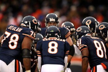 CHICAGO - NOVEMBER 09:  Rex Grossman #8 of the Chicago Bears calls a play in the huddle against the Tennessee Titans at Soldier Field on November 9, 2008 in Chicago, Illinois. The Titans won 21-14.  (Photo by Jonathan Ferrey/Getty Images)