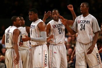 NEW YORK - MARCH 13:  A.J. Price #12, Craig Austrie #24, Jeff Adrien #4, Stanley Robinson #21 and Hasheem Thabeet #34  of the Connecticut Huskies looks on against the West Virginia Mountaineers during day two of the 2008 Big East Men's Basketball Champion