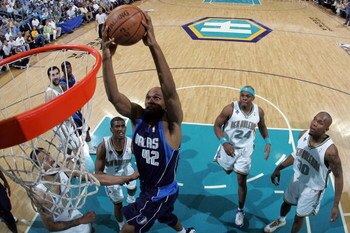 NEW ORLEANS - APRIL 29:  Jerry Stackhouse #42 of the Dallas Mavericks dunks the ball over Tyson Chandler #6 of the New Orleans Hornets in Game Five of the Western Conference Quarterfinals during the 2008 NBA Playoffs at The New Orleans Arena April 29, 200