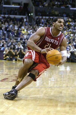 LOS ANGELES - APRIL 17:  Jim Jackson #21 of the Houston Rockets slips with the ball during Game one of the Western Conference Quarterfinals against the Los Angeles Lakers during the 2004 NBA Playoffs at Staples Center on April 17, 2004 in Los Angeles, Cal