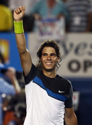 MELBOURNE, AUSTRALIA - FEBRUARY 01:  Rafael Nadal of Spain celebrates after winning championship point in his men's final match against Roger Federer of Switzerland during day fourteen of the 2009 Australian Open at Melbourne Park on  February 1, 2009 in 