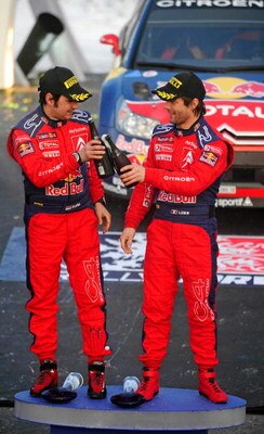 HAMAR, NORWAY - FEBRUARY 15:  Sebastien Loeb (R) of France and Daniel Elena of Monaco, celebrate after overall victory in Rally Norway 2009 on February 15, 2009 in Hamar, Norway.  (Photo by Reporter Images/Getty Images)