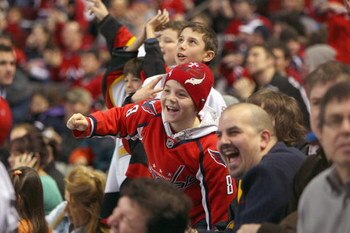 MONTREAL - JANUARY 24:  A young fan cheers during the mascot game as part of the 2009 NHL All-Star weekend on Jaunary 24, 2009 at the Bell Centre in Montreal, Canada.  (Photo by Bruce Bennett/Getty Images)