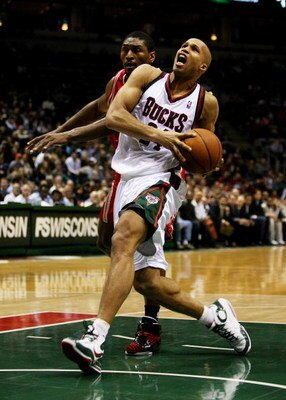 MILWAUKEE - FEBRUARY 09: Richard Jefferson #24 of the Milwaukee Bucks drives to the basket past Ron Artest #96 of the Houston Rockets on February 9, 2009 at the Bradley Center in Milwaukee, Wisconsin. The Bucks defeated the Rockets 124-112. NOTE TO USER: 