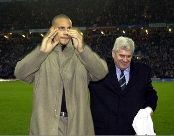 26 Nov 2000:  Record signing Rio Ferdinand of Leeds United  (centre) with Peter Ridsdale before the FA Carling Premiership match between Leeds United and Arsenal at Elland Road Leeds, England.  Digital Image. Mandatory Credit: Ross Kinnaird/ALLSPORT