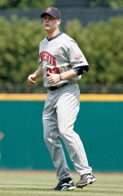 CLEVELAND - JULY 27:  Justin Morneau #33 of the Minnesota Twins warms up onfield before the game against the Cleveland Indians at Progressive Field on July 27, 2008 in Cleveland, Ohio.  (Photo by:  Gregory Shamus/Getty Images)