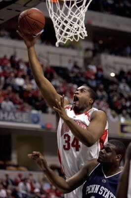 INDIANAPOLIS - MARCH 10:  Terence Dials #34 of the Ohio State Buckeyes lays the ball up over Travis Parker #11 of the Penn State Nittany Lions during Day 2 of the Big 10 Tournament on March 10, 2006 at Conseco Fieldhouse in Indianapolis, Indiana.  (Photo 