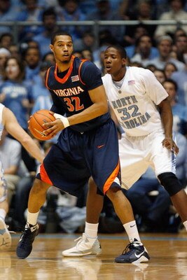 CHAPEL HILL, NC - FEBRUARY 07:  Mike Scott #32 of the Virginia Cavaliers posts up against Ed Davis #32 of the North Carolina Tar Heels on February 7, 2009 at the Dean E. Smith Center in Chapel Hill, North Carolina.  (Photo by Kevin C. Cox/Getty Images)