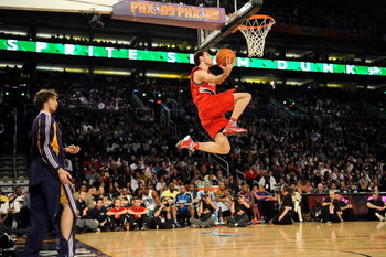 PHOENIX - FEBRUARY 14: Pau Gasol of the Los Angeles Lakers throws a pass to Rudy Fernandez of the Portland Trail Blazers during the Sprite Slam Dunk Contest on All-Star Saturday Night, part of 2009 NBA All-Star Weekend at US Airways Center on February 14