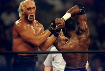 12 Jun 1998:  Hollywood Hogan (left) in action against Karl (Mailman) Malone during the WCW Bash at the Beach at the Cox Arena in San Diego, California. Mandatory Credit: Elsa Hasch  /Allsport