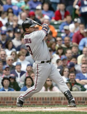 CHICAGO - MAY 5:  Jesus Flores #3 of the Washington Nationals swings at the pitch against the Chicago Cubs on May 5, 2007 at Wrigley Field in Chicago, Illinois. The Cubs defeated the Nationals 5-3. (Photo by Jonathan Daniel/Getty Images) 