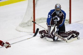 DETROIT - FEBRUARY 6:  Patrick Roy #33 of the Colorado Avalanche makes a save against the Detroit Red Wings at Joe Louis Arena on February 6, 2003 in Detroit, Michigan.  The Avalanche defeated the Red Wings 1-0.  (Photo by Tom Pidgeon/Getty Images/NHLI)