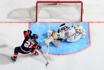 UNIONDALE, NY - FEBRUARY 16:  Kyle Okposo #21 of the New York Islanders is stopped on his shootout attempt against Marc-Andre Fleury #29 of the Pittsburgh Penguins on February 16, 2009 at Nassau Coliseum in Uniondale, New York. The Isles defeated the Pens