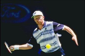 Jan 1997:  Boris Becker of Germany in action against Carlos Moya of Spain during the Australian Open at Flinders Park in Melbourne, Australia. Moya wnt on to win the match.   Mandtory Credit: Clive Brunskill/Allsport