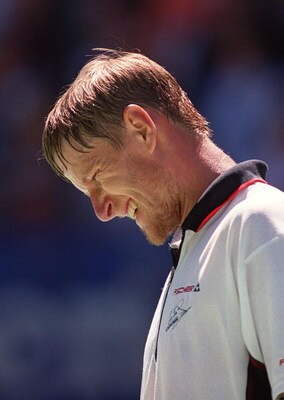 30 Jan 2000:  Yevgeny Kafelnikov of Russia shows his frustration in his match against Andre Agassi of the USA in the men's final at the Australian Open Tennis Championships at Melbourne Park in Melbourne, Australia. Agassi defeated Kafelnikov 3-6, 6-3, 6-