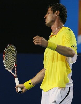 MELBOURNE, AUSTRALIA - JANUARY 23:  Marat Safin of Russia reacts after a point in his third round match against Roger Federer of Switzerland during day five of the 2009 Australian Open at Melbourne Park on January 23, 2009 in Melbourne, Australia.  (Photo