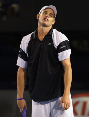 MELBOURNE, AUSTRALIA - JANUARY 29:  Andy Roddick of the United States of America reacts after a point in his semifinal match against Roger Federer of Switzerland during day eleven of the 2009 Australian Open at Melbourne Park on January 29, 2009 in Melbou