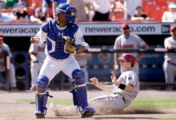 NEW YORK - JUNE 12: Ramon Castro #11 of the New York Mets forces out Stephen Drew #6 of the Arizona Diamonbacks at home in the ninth inning on June 12, 2008 at Shea Stadium in the Flushing neighborhood of the Queens borough of New York City.  (Photo by Ji