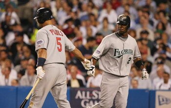 NEW YORK - JULY 15:  Hanley Ramirez #2 shakes hands with National League All-Stars teammate Albert Pujols #5 against the American League All-Stars during the 79th MLB All-Star Game at Yankee Stadium on July 15, 2008 in New York, New York. (Photo by Nick L