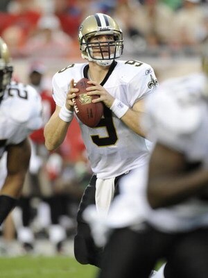 TAMPA, FL - NOVEMBER 30: Quarterback Drew Brees #9 of the New Orleans Saints sets to pass against the Tampa Bay Buccaneers at Raymond James Stadium on November 30, 2008 in Tampa, Florida.  (Photo by Al Messerschmidt/Getty Images) 