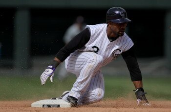 DENVER - MAY 18:  Center fielder Willy Taveras #3 of the Colorado Rockies steals second base against the Minnesota Twins during Interleague MLB action at Coors Field on May 18, 2008 in Denver, Colorado. The Rockies defeated the Twins 6-2.  (Photo by Doug 