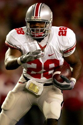 MADISON, WI - OCTOBER 04:  Chris Wells #28 of the Ohio State Buckeyes carries the ball against the Wisconsin Badgers at Camp Randall Stadium  October 4, 2008 in Madison, Wisconsin.  (Photo by Matthew Stockman/Getty Images)
