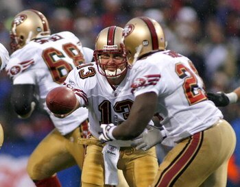 ORCHARD PARK, NY - NOVEMBER 30: Shaun Hill #13 of the San Francisco 49ers hands off to Frank Gore #21 against the Buffalo Bills   on November 30, 2008 at Ralph Wilson Stadium in Orchard Park, New York.  The 49ers won10-3.  (Photo by Rick Stewart/Getty Ima