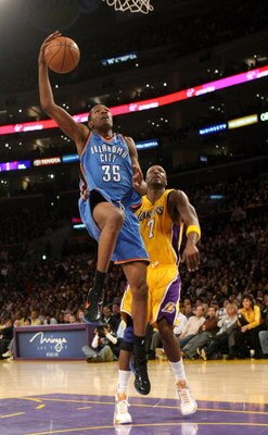LOS ANGELES - FEBRUARY 10:  Kevin Durant #35 of the Oklahoma City Thundergoes up for a shot over Lamar Odom #7 of the Los Angeles Lakers on February 10, 2009 at Staples Center in Los Angeles, California.  The Lakers won 105-98.   NOTE TO USER: User expres