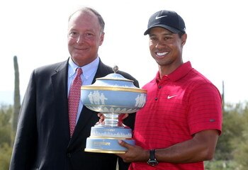 MARANA, AZ - FEBRUARY 24:  Tiger Woods poses with William Green of Accenture and the Walter Hagen Cup after winning the WGC-Accenture Match Play Championship at The Gallery at Dove Mountain on February 24, 2008 in Marana, Arizona.  (Photo by Scott Hallera