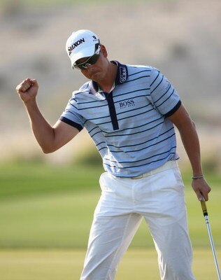 DOHA, QATAR - JANUARY 25:  Henrik Stenson of Sweden celebrates his birdie on the 15th hole during the final round of the Commercialbank Qatar Masters at Doha Golf Club on January 25, 2009 in Doha, Qatar.  (Photo by Andrew Redington/Getty Images)