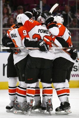 NEW YORK - FEBRUARY 15:  The Philadelphia Flyers celebrate on the ice during the game against the New York Rangers on February 15, 2009 at Madison Square Garden in New York City.  (Photo by Chris McGrath/Getty Images)