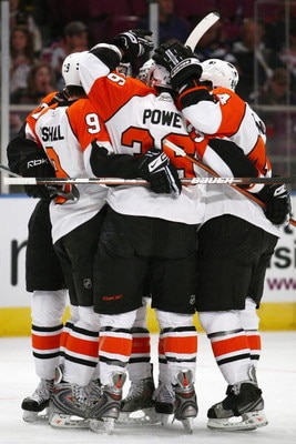 NEW YORK - FEBRUARY 15:  The Philadelphia Flyers celebrate on the ice during the game against the New York Rangers on February 15, 2009 at Madison Square Garden in New York City.  (Photo by Chris McGrath/Getty Images)