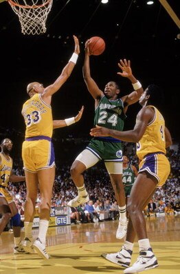 LOS ANGELES - 1987:  Mark Aguirre #24 of the Dallas Mavericks leaps for the basket during the NBA game against the Los Angeles Lakers at the Great Western Forum in Los Angeles, California in 1987.  (Photo by Mike Powell/Getty Images)