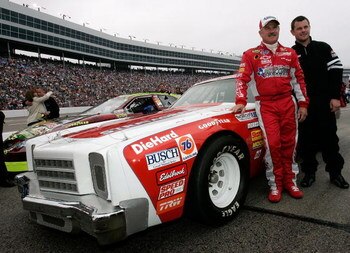 FORT WORTH, TX - NOVEMBER 05:  Terry Labonte, driver of the #44 Kellogg's Chevrolet and his son Justin pose for a photo next to a replica of Terry's first race car prior to the NASCAR Nextel Cup Series Dickies 500, on November 5, 2006 at Texas Motor Speed