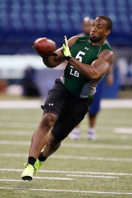 INDIANAPOLIS, IN - FEBRUARY 23:  Linebacker Aaron Curry of Wake Forest catches the football during the NFL Scouting Combine at Lucas Oil Stadium on February 23, 2009 in Indianapolis, Indiana. (Photo by Scott Boehm/Getty Images)