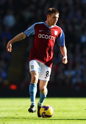 BIRMINGHAM, UNITED KINGDOM - FEBRUARY 21: James Milner of Aston Villa in action during the Barclays Premier League match between Aston Villa and Chelsea at Villa Park on February 21, 2009 in Birmingham, England.  (Photo by Clive Brunskill/Getty Images)
