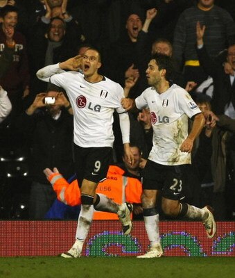 LONDON - FEBRUARY 24: Bobby Zamora of Fulham celebrates his goal with Clint Dempsey of Fulham during the FA Cup sponsored by E.on Fifth Round Replay match between Fulham and Swansea City at Craven Cottage on February 24, 2009 in London, England.  (Photo b