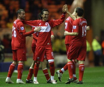 MIDDLESBROUGH, UNITED KINGDOM - FEBRUARY 25:  Tuncay Sanli of Middlesbrough is congratulated after the second goal during the FA Cup 5th Round Replay match sponsored by e.on between Middlesbrough and West Ham United at The Riverside Stadium on February 25