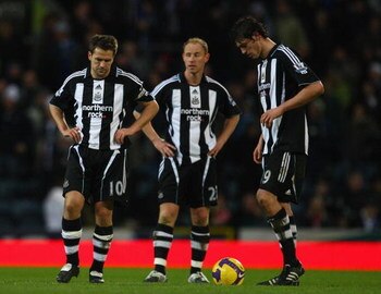 BLACKBURN, UNITED KINGDOM - JANUARY 17:l-r Michael Owen, Nicky Butt and Andrew Carroll of Newcastle show their dissapointment  during the Barclays Premier League match between Blackburn Rovers and Newcastle United at Ewood Park on January 17, 2009 in Blac