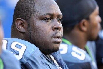 SEATTLE - SEPTEMBER 14: Rocky Bernard #99 of the Seattle Seahawks watches the action from the bench during the game against the San Francisco 49ers on September 14, 2008 at Qwest Field in Seattle Washington. (Photo by Otto Greule Jr/Getty Images) 